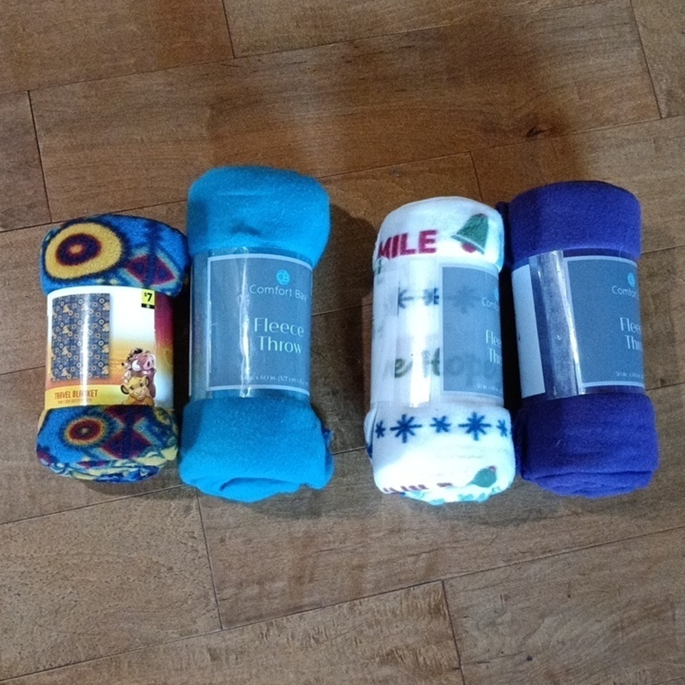 Lot of 4 Travel throw blankets. (G)​​​​​
